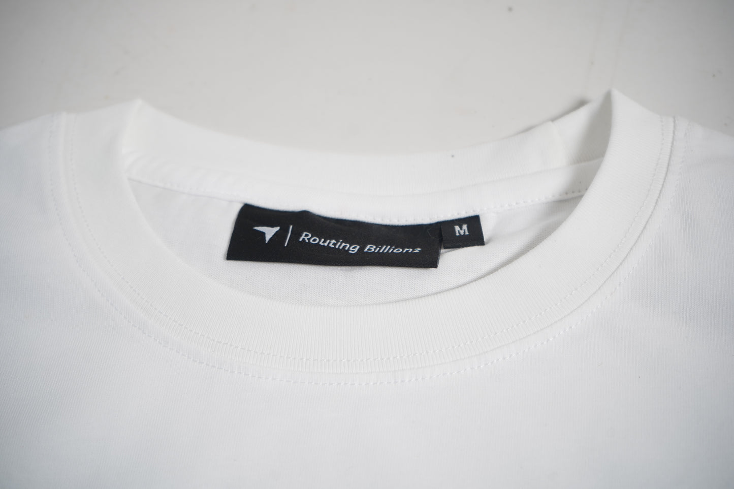 Routing Billionz Signature Rubber Logo Tee – Core White